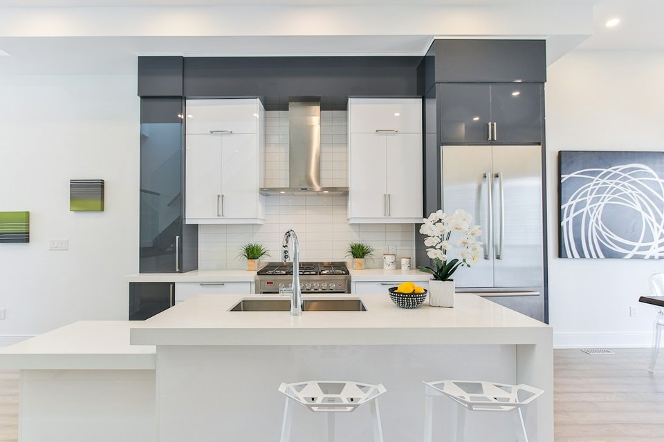 Clean kitchen cabinets, worktops and flooring illustrating a thorough home deep clean